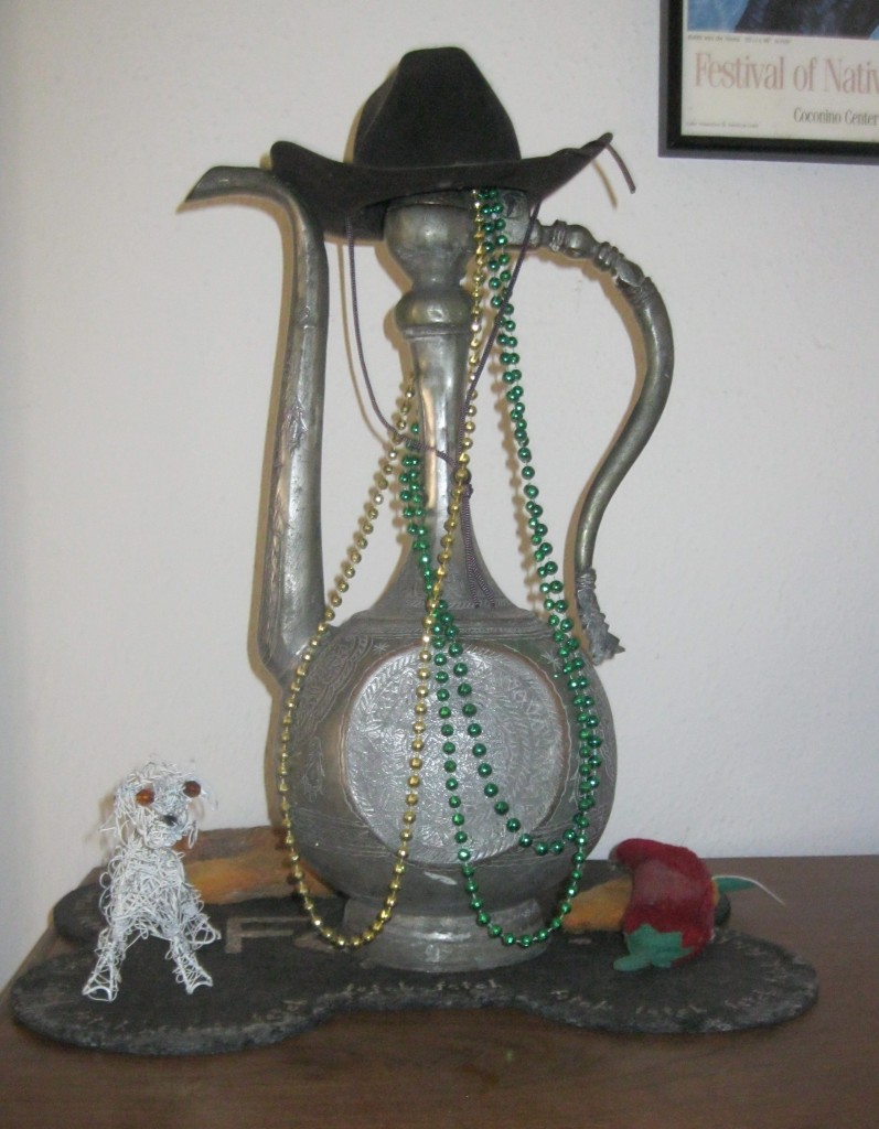 Frankie shrine with cowboy hat, squeaky chile forward
